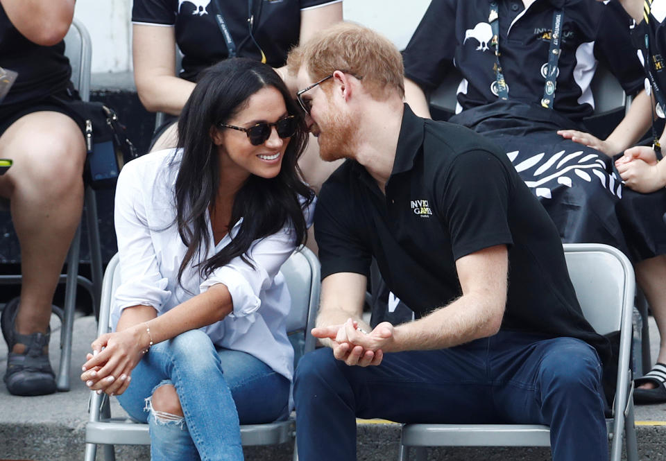 Britain's Prince Harry and his girlfriend actress Meghan Markle watch the wheelchair tennis event during the Invictus Games in Toronto, Ontario, Canada September 25, 2017.   REUTERS/Mark Blinch