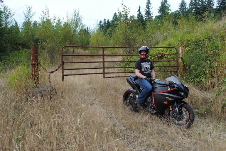 Alex Randall posing on his Yamaha R1 (photo courtesy of the Seattle Times)