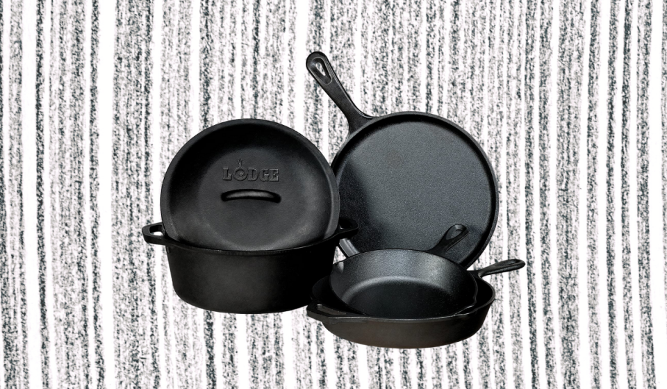 Cast iron griddle pan, pot, lid, and two skillets with handles.