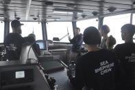 Capt. Peter Hammarstedt, campaign director of Sea Shepherd, addresses the crew of the Ocean Warrior on July 13, 2021, during its 18-day high seas voyage to inspect the Chinese overseas fleet as it fishes for squid off the west coast of South America. Hammarstedt says, “Beijing is exporting its overfishing problem to South America.” (AP Photo/Joshua Goodman)