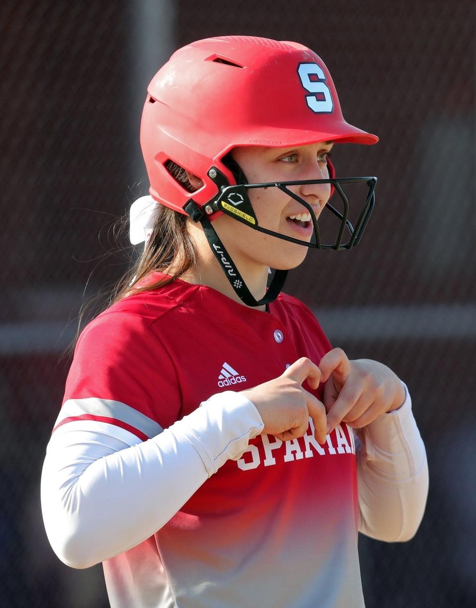 Springfield center fielder Destiny Ruggiero flashes a heart before stepping up to the plate in 2022. The Spartans are hoping for a repeat season from their standout.