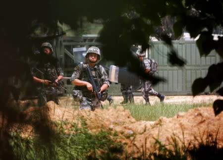 PLA troops conduct riot drills at the PLA's base in Tam Mei camp in Hong Kong