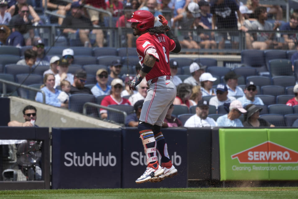 Cincinnati Reds' Jonathan India celebrates hitting a home run during the third inning of a baseball game against the New York Yankees, Thursday, July 4, 2024, in New York. (AP Photo/Pamela Smith)