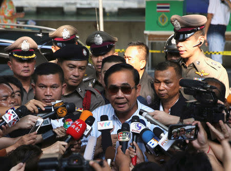 Thailand's Prime Minister Prayuth Chan-ocha speaks to media after voting in the general election at a polling station in Bangkok, Thailand, March 24, 2019. REUTERS/Athit Perawongmetha