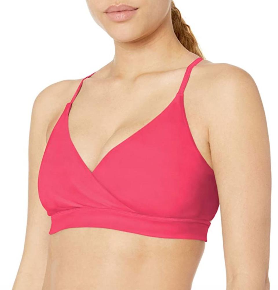 This <a href="https://amzn.to/2XRug4L" target="_blank" rel="noopener noreferrer">ballerina sports bra</a> has a crossover front that helps give light support and a back with lots of straps and some cutouts. It's made of nylon and spandex for a compression fit. <br /><br /><strong>Sizes:</strong> This sports bra comes in sizes XS to 3X. <br /><strong>Rating:</strong> It has a 4-star rating over almost 500 reviews. <br /><strong>$$$:</strong> <a href="https://amzn.to/2XRug4L" target="_blank" rel="noopener noreferrer">Find it for $26 at Amazon</a>.