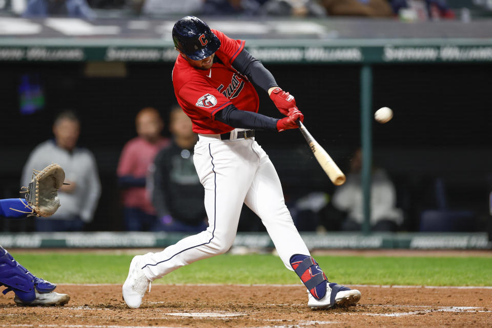 Cleveland Guardians' Owen Miller hits a two-run home run off Kansas City Royals starting pitcher Daniel Lynch during the fifth inning of a baseball game, Tuesday, Oct. 4, 2022, in Cleveland. (AP Photo/Ron Schwane)