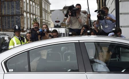 Lord Greville Janner (L) arrives at Westminster Magistrates' Court in London, Britain August 14, 2015. REUTERS/Toby Melville