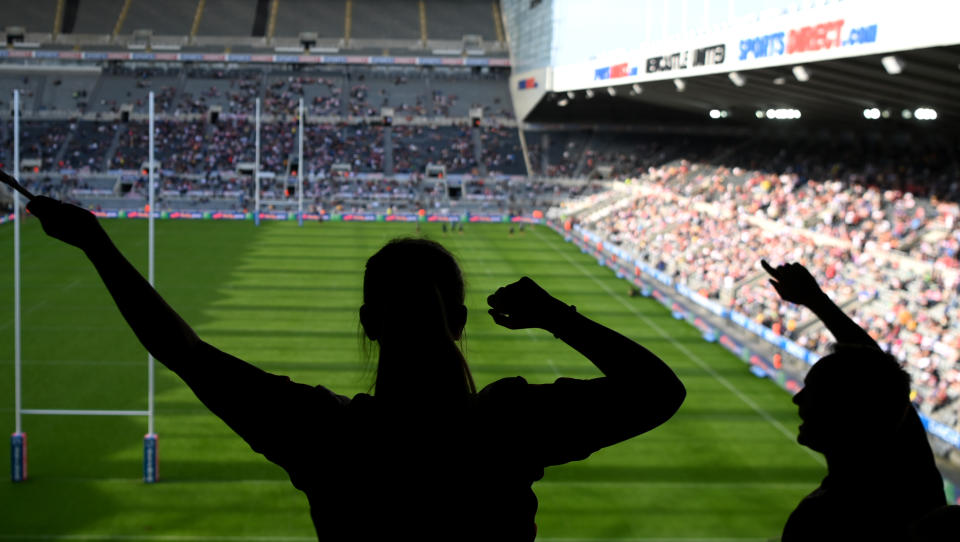 <p>NEWCASTLE UPON TYNE, ENGLAND - SEPTEMBER 05: Rugby League fans enjoying the atmosphere during the Betfred Super League match between Huddersfield Giants and Wakefield Trinity at St James' Park on September 05, 2021 in Newcastle upon Tyne, England. (Photo by Stu Forster/Getty Images)</p>
