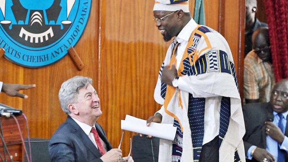 Jean-Luc Mélenchon (L) and Senegalese Prime Minister Ousmane Sonko delivers a speech during a conference at the Cheikh Anta Diop university in Dakar - 16 May 2024