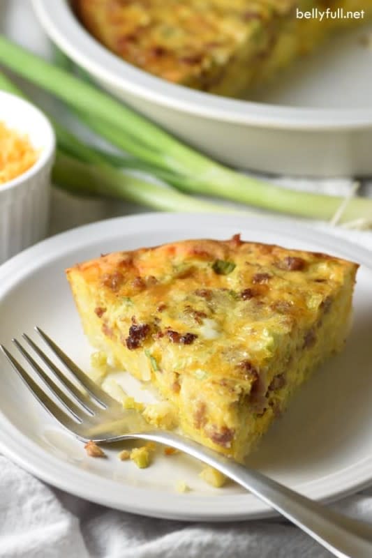 Belly Full<p>This Hash Brown Crusted Quiche with Sausage is crazy flavorful, super easy, & gluten-free. Enjoy this simple recipe for breakfast, brunch, or even dinner!</p><p><strong>Get the recipe: </strong><a href="https://bellyfull.net/2014/05/04/hash-brown-crusted-quiche-with-sausage/" rel="sponsored" target="_blank" data-ylk="slk:Hash Brown-Crusted Quiche with Sausage;elm:context_link;itc:0;sec:content-canvas" class="link "><strong>Hash Brown-Crusted Quiche with Sausage</strong></a></p>