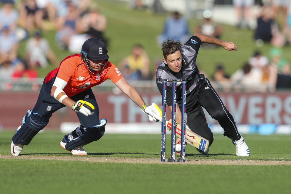 New Zealand's Tim Southee tries to run out England's Jonny Bairstow during the T20 cricket match between England and New Zealand in Napier, New Zealand, Friday, Nov. 8, 2019. (John Cowpland/Photosport via AP)