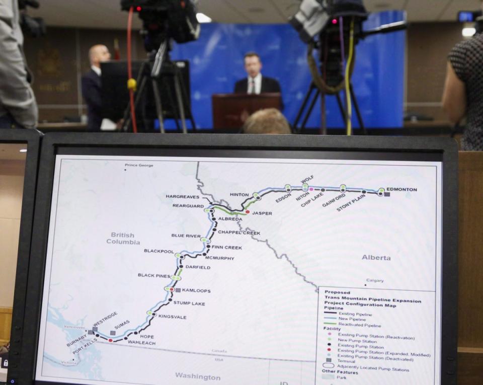 A map of the proposed Trans Mountain project seen as Dr. Robert Steedman, Chief Environment Officer of the National Energy Board releases their report on the expansion project, in Calgary in May. The Canadian Press/Jeff McIntosh