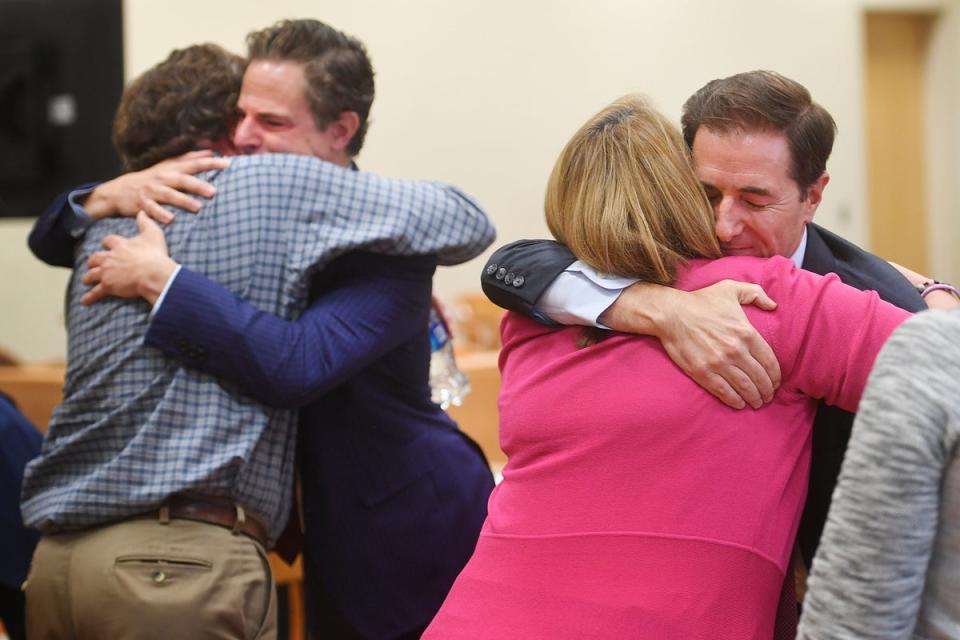 Sandy Hook families embrace as the jury delivers its verdict on compenstory damages (Connecticut Post)