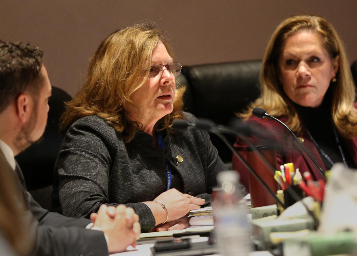 Portsmouth City Attorney Susan Morrell, center, reports about a meeting city leaders had hours earlier with the General Services Administration regarding the McIntyre federal building. Morrell speaks during a special City Council meeting Friday, March 31, 2023, with Councilor Andrew Bagley to her right and City Manager Karen Conard to her left.