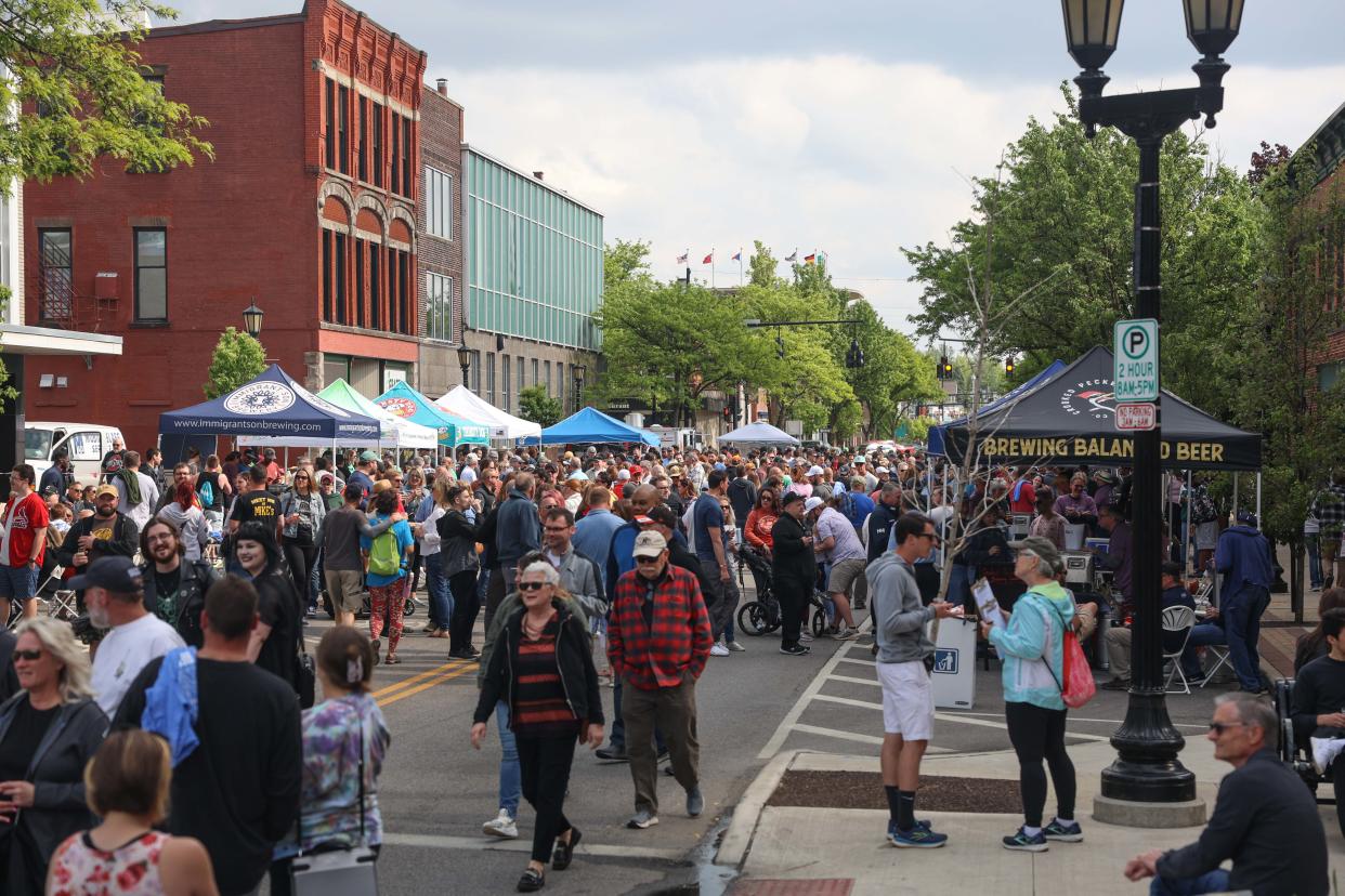 Crowds fill North Water Street in downtown Kent for the fifth annual Kent Craft Beer Fest hosted by the Kent Jaycees on Saturday.