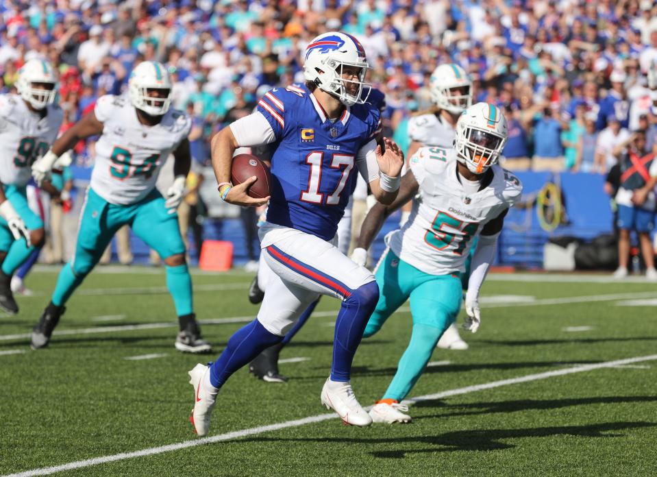 Josh Allen of the Buffalo Bills breaks off a run against the Miami Dolphins.