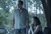 This image released by Netflix shows Michael Mosley, left, and Bethany Anne Lind in a scene from "Ozark." (Jackson Davis/Netflix via AP)