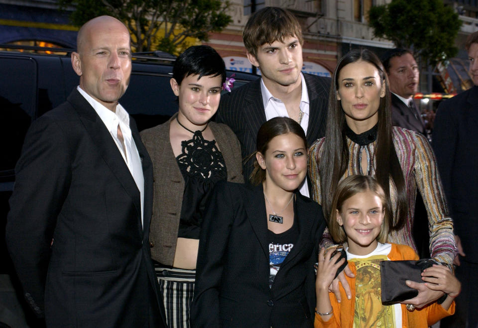 Bruce Willis, Ashton Kutcher and Demi Moore with daughters (Photo by L. Cohen/WireImage)