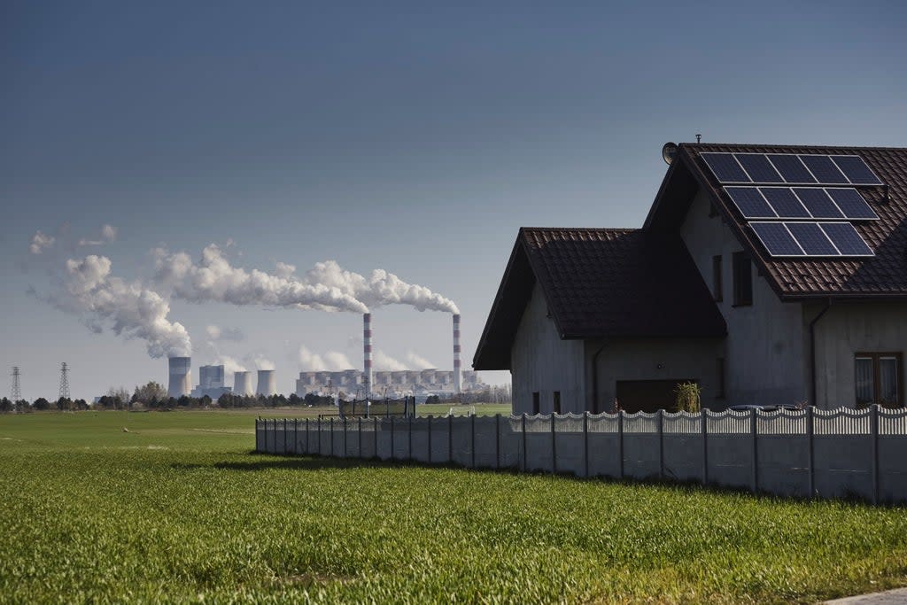 Solar panels on a residential property in Belchatow, Poland (Bloomberg photo by Bartek Sadowski.)