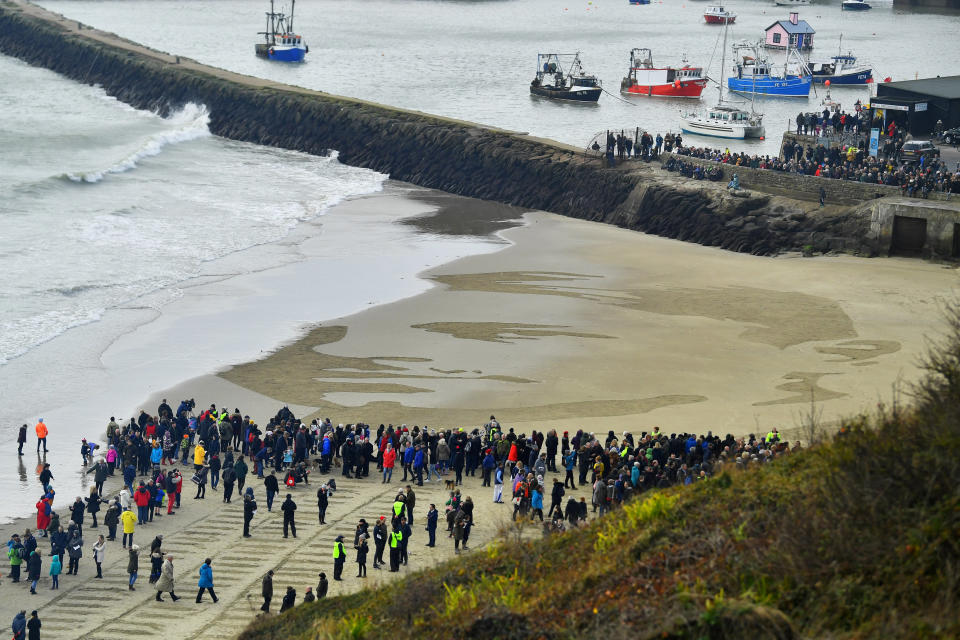 <p>The tide washes away a portrait of Wilfred Edward Salter Owen, who was killed in World War One, which is part of Danny Boyle’s Pages of The Sea celebrations, on Sunny Sands beach in Folkestone, Britain, November 11, 2018. REUTERS/Dylan Martinez </p>