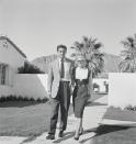 <p>While at the iconic La Quinta resort in Palm Springs, the actress and her husband take a stroll outside their room on the desert grounds. </p>