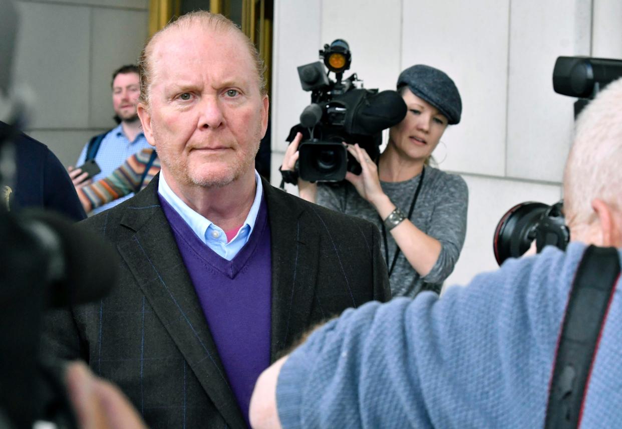 Chef Mario Batali departs municipal court in Boston on May 24, 2019, after pleading not guilty to an allegation that he forcibly kissed and groped a woman at a Boston restaurant in 2017.