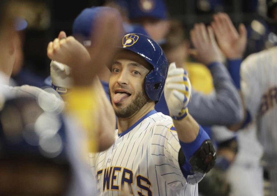 Milwaukee Brewers' Ryan Braun celebrates his three-run home run during the third inning of a baseball game against the St. Louis Cardinals Friday, March 29, 2019, in Milwaukee. (AP Photo/Morry Gash)