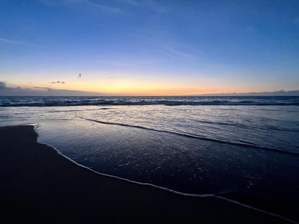 Twilight at Hapuna Beach, with purple and dark blue skies