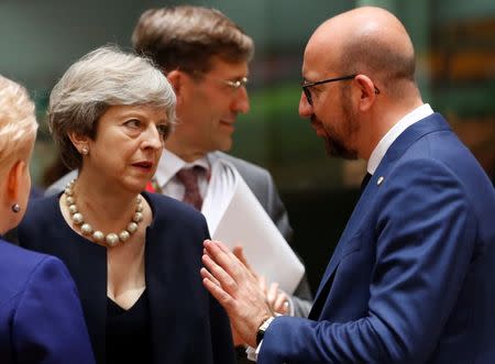 British Prime Minister Theresa May and Belgian Prime Minister Charles Michel attend the EU summit in Brussels, Belgium, June 22, 2017. REUTERS/Francois Lenoir