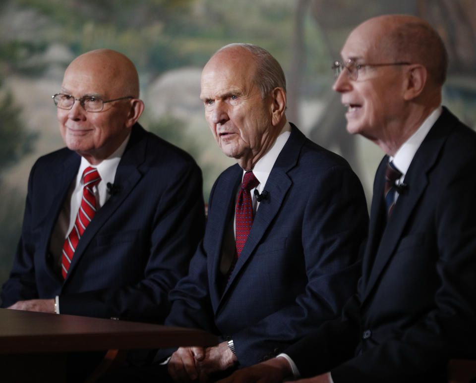 Russell M. Nelson (center), First Counselor Dallin H. Oaks (left), and Second Counselor Henry B. Eyring (right) answer press questions after Nelson was announced as the 17th president of the Mormon Church. (Photo: George Frey via Getty Images)