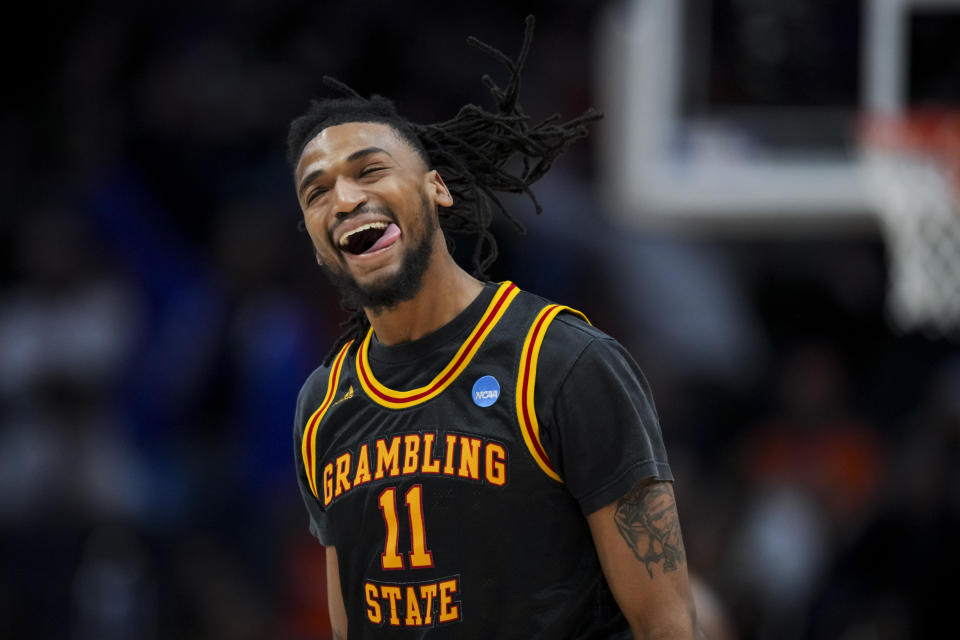 Grambling State guard Jourdan Smith reacts to making a 3-point basket against Montana State during the second half of a First Four game in the NCAA men's college basketball tournament Wednesday, March 20, 2024, in Dayton, Ohio. (AP Photo/Aaron Doster)