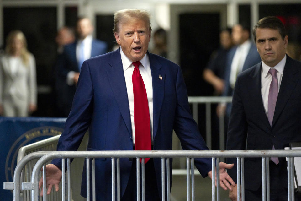 FILE - Former President Donald Trump speaks outside the courtroom in New York, April 30, 2024. A gag order bars him from making public comments on witnesses, jurors and some others connected to the case. The judge found that Trump repeatedly violated the order and he fined Trump $9,000 and warned that jail could follow if Trump keeps it up. The order doesn't stop Trump from talking about the allegations against him or commenting on the judge or the elected top prosecutor. And it doesn't stop him from testifying in court if he chooses. (Justin Lane/Pool Photo via AP, File)