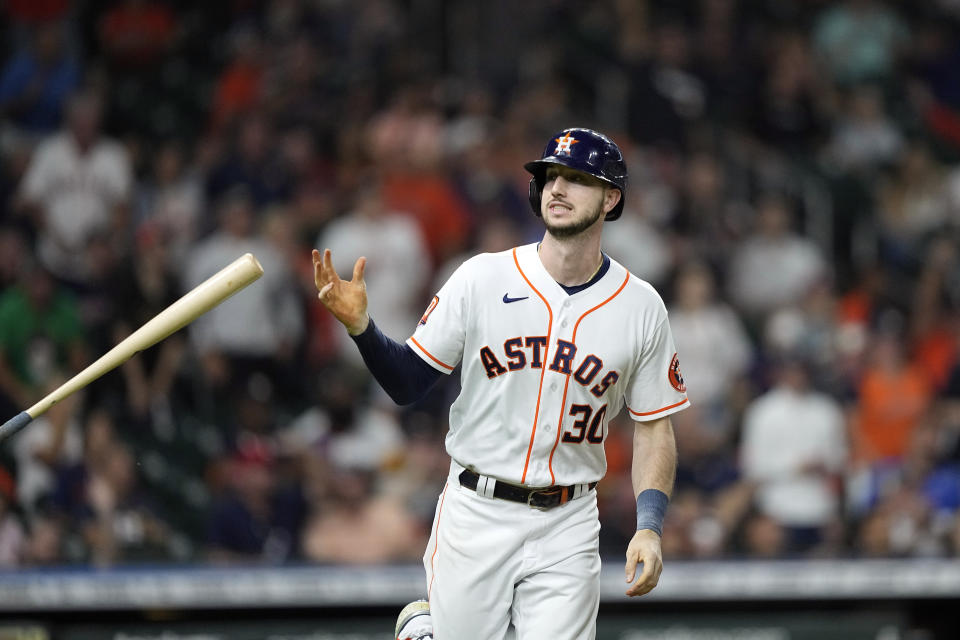 Houston Astros' Kyle Tucker (30) flips his bat after hitting a three-run home run against the Philadelphia Phillies during the first inning of a baseball game Tuesday, Oct. 4, 2022, in Houston. (AP Photo/David J. Phillip)