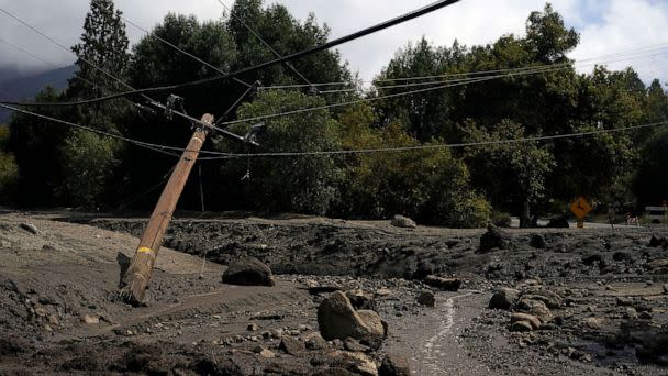 PHOTO: Electric poles are seen half-fallen in the aftermath of a mudslide, Sept. 13, 2022, in Oak Glen, Calif.  (Marcio Jose Sanchez/AP)