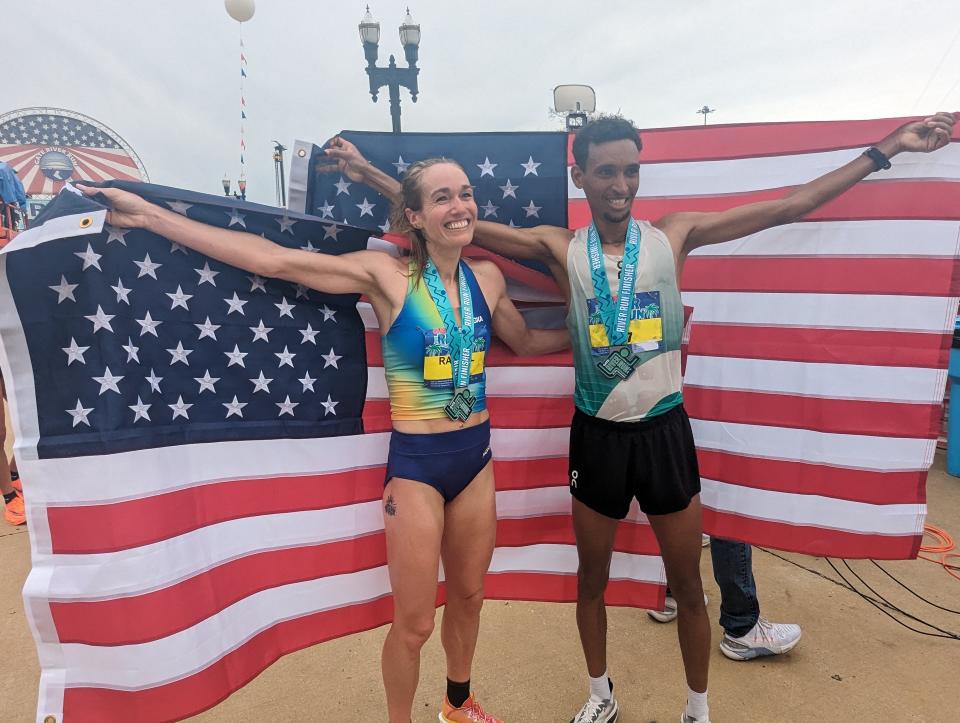 Teshome Asfaha Mekonen, right, and Rachel Smith won Saturday's Gate River Run in downtown Jacksonville. Mekonen won the 15K national championship in 42:51; Smith won the women's race in 48:26.