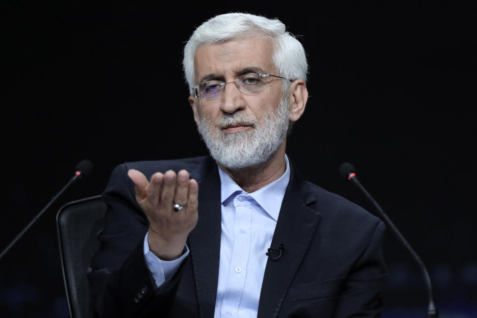 In this photo made available by Iranian state-run TV, IRIB, Iranian presidential candidate Saeed Jalili, a hard-line former nuclear negotiator, speaks during a debate with reformist candidate Masoud Pezeshkian at the TV studio in Tehran, Iran, Monday, July 1, 2024. (Morteza Fakhri Nezhad/IRIB via AP)