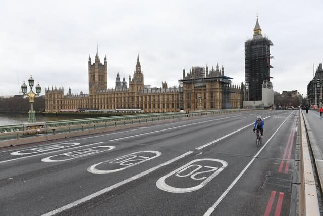 A quiet Westminster Bridge in London, where people have been advised against all but essential trave