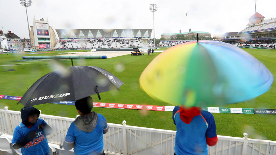 Fans brave the weather during the match at Trent Bridge, Nottingham. (Photo by Simon Cooper/PA Images via Getty Images)