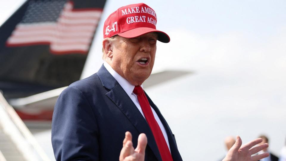 PHOTO: Republican presidential candidate and former President Donald Trump speaks as he arrives at Hartsfield-Jackson Atlanta International Airport in Atlanta, GA, April 10, 2024.   (Alyssa Pointer/Reuters)