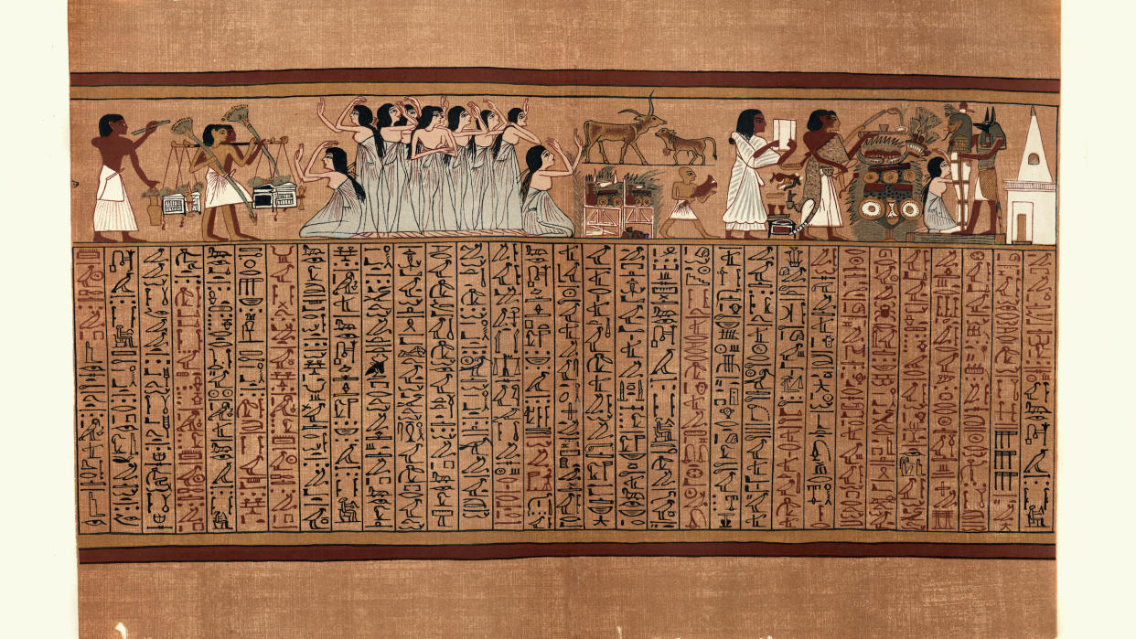  Here we see a photo of a section of the Book of the Dead. Hieroglyphics are on the bottom and illustrations of people doing funerary rites are on top. 