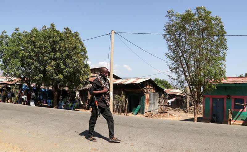 A member of the Amhara Special Force patrols a street in Soroka village in Amhara region near a border with Tigray