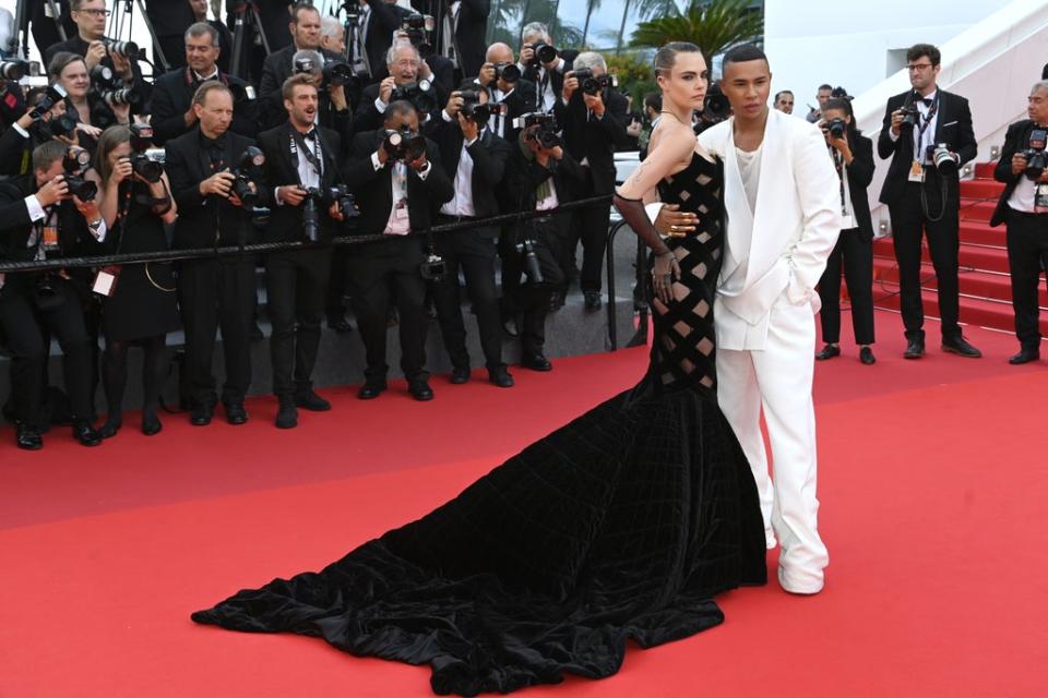 Olivier Rousteing and Cara Delevingne (Doug Peters/PA)