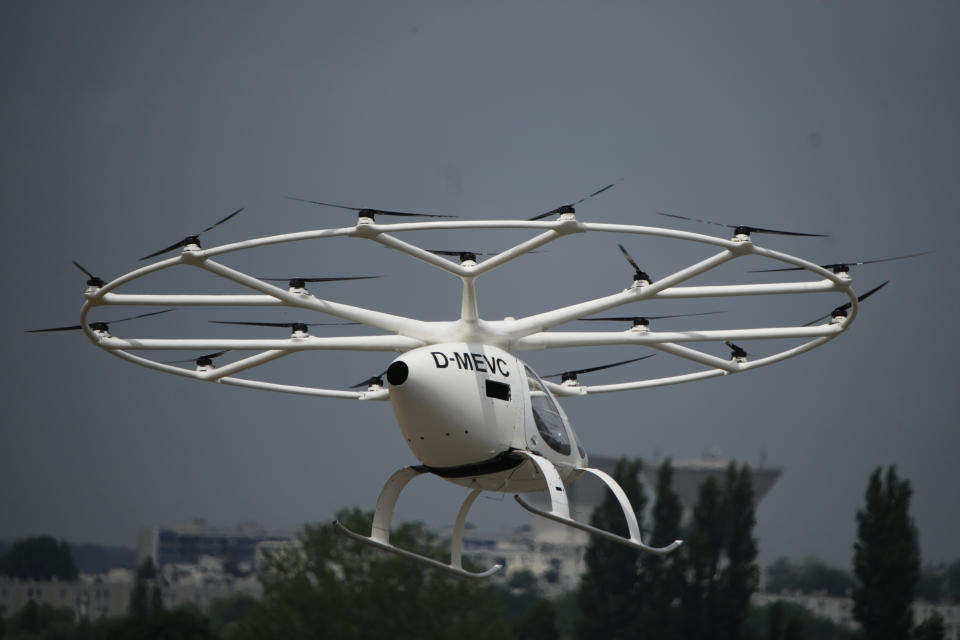 The Volocopter 2X, an electric vertical takeoff and landing multicopter, performs a demonstration flight during the Paris Air Show in Le Bourget, north of Paris, France, Monday, June 19, 2023. (AP Photo/Lewis Joly)