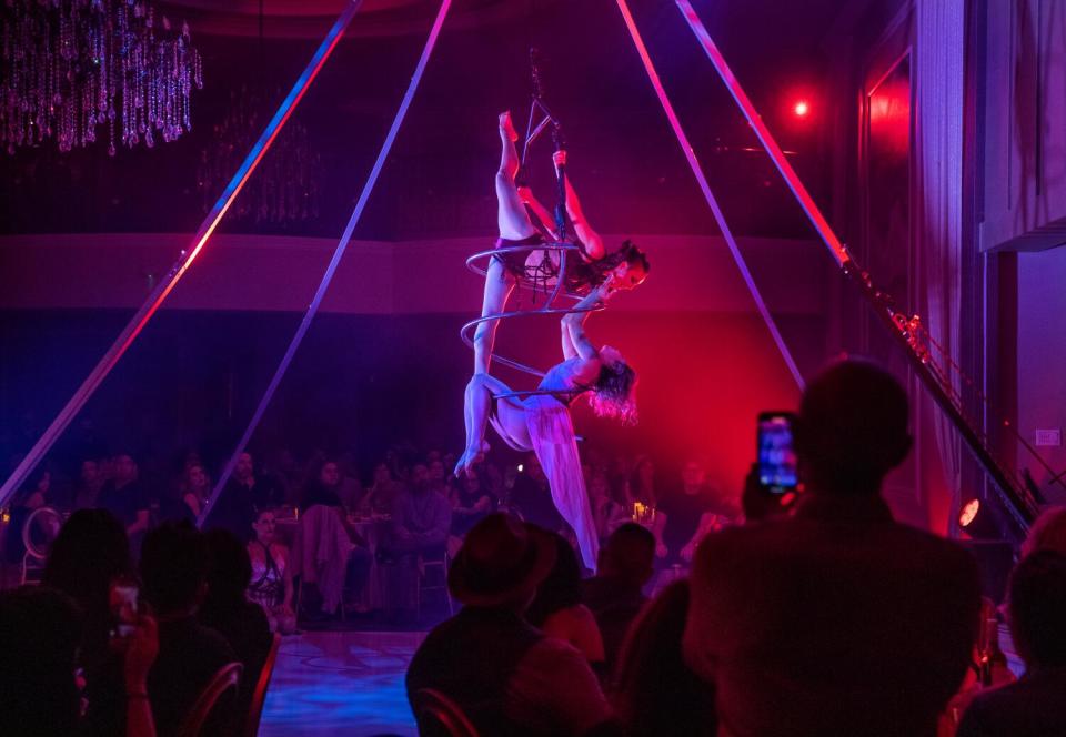 Frankie Tan as the Countess Dracula and Lala Araki as the Lover during an aerialist performance.