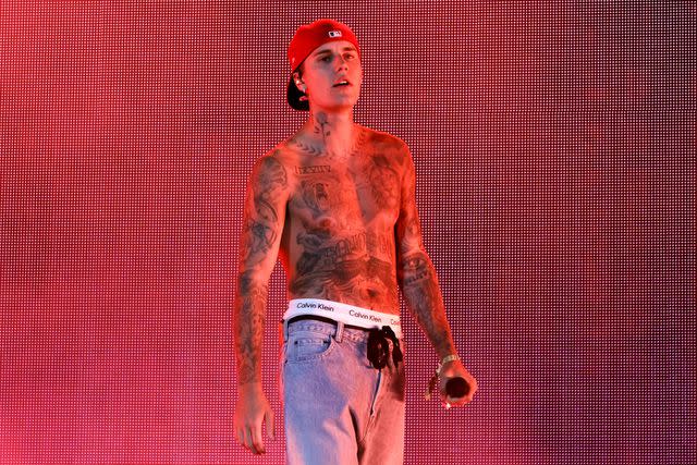 Kevin Winter/Getty Images Justin Bieber performs with Daniel Caesar onstage at the Coachella Stage during the 2022 Coachella Valley Music And Arts Festival