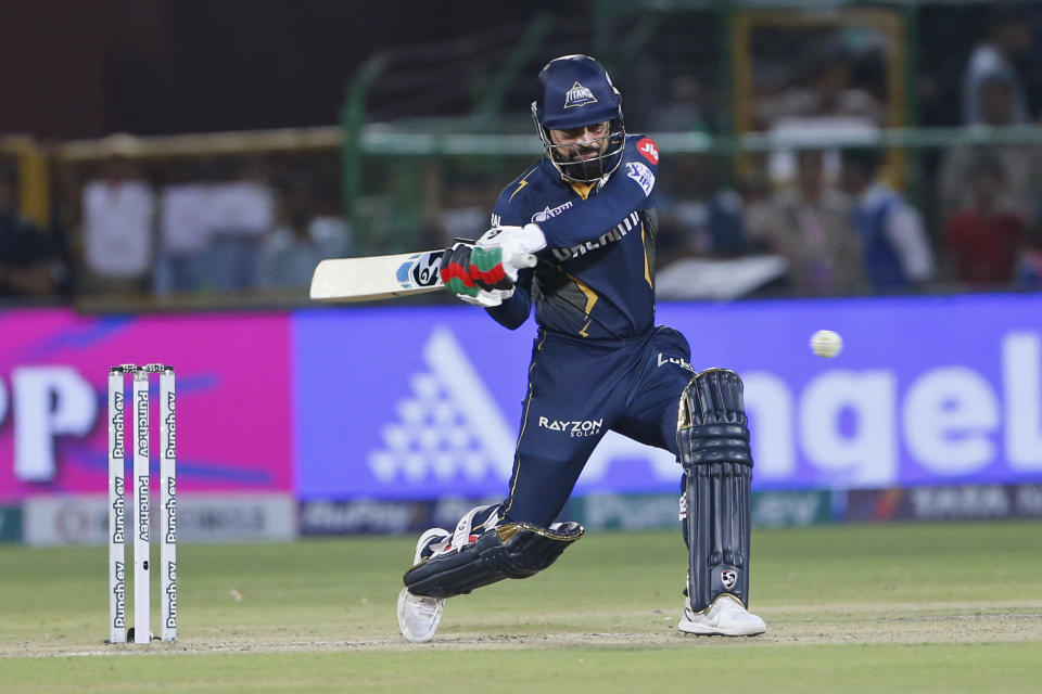 Gujarat Titans' Rashid Khan bats during the Indian Premier League cricket match between Gujarat Titans and Rajasthan Royals in Jaipur, India, Wednesday, April 10, 2024. (AP Photo/Surjeet Yadav)