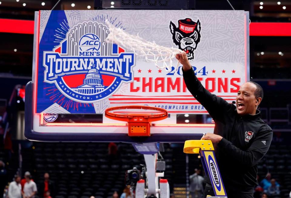 N.C. State’s head coach Kevin Keatts celebrates after cutting down the net after N.C. State’s 84-76 victory over UNC in the championship game of the 2024 ACC Men’s Basketball Tournament at Capital One Arena in Washington, D.C., Saturday, March 16, 2024. Ethan Hyman/ehyman@newsobserver.com