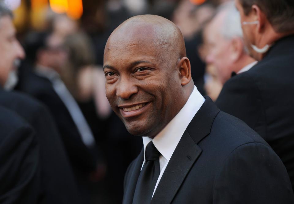 In this Feb. 24, 2008 file photo, director John Singleton arrives at the 80th Academy Awards in Los Angeles. Oscar-nominated filmmaker John Singleton has died at 51, according to statement from his family, Monday, April 29, 2019. He died Monday after suffering a stroke almost two weeks ago. 