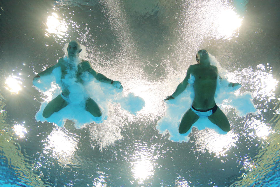 LONDON, ENGLAND - JULY 30: Tom Daley (R) and Peter Waterfield of Great Britain compete in the Men's Synchronised 10m Platform Diving on Day 3 of the London 2012 Olympic Games at the Aquatics Centre on July 30, 2012 in London, England. (Photo by Adam Pretty/Getty Images)