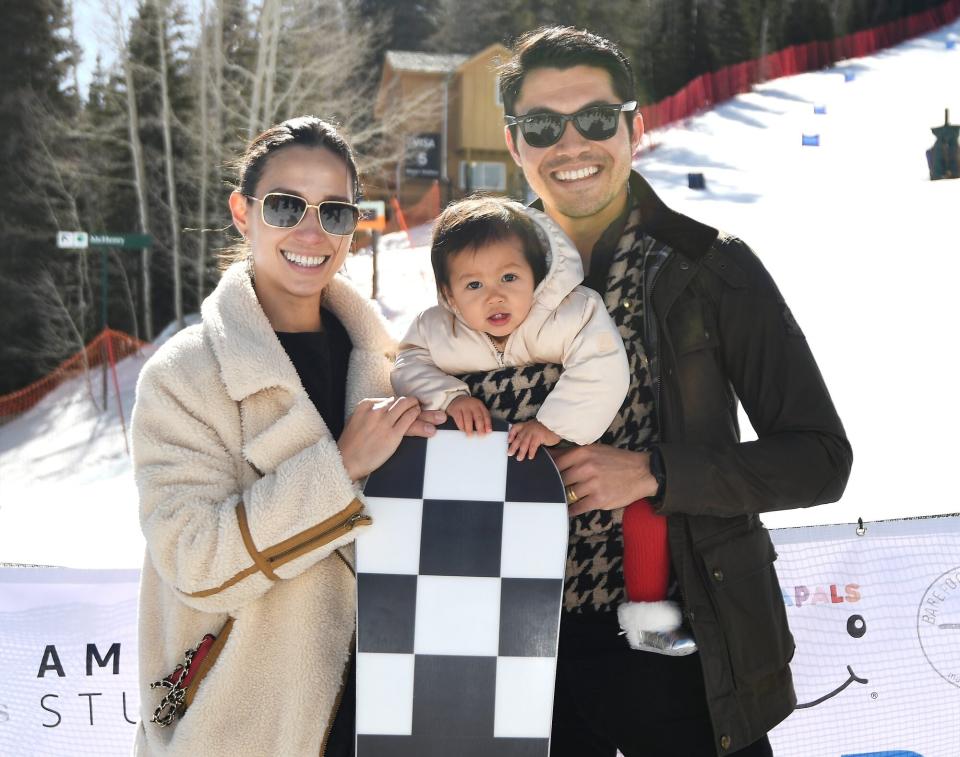 PARK CITY, UTAH - APRIL 02: Henry Golding (R) with wife Liv Lo and daughter Lyla Golding attend Operation Smile's 10th Annual Park City Ski Challenge Presented By The St. Regis Deer Valley &amp; Deer Valley Resort at The St. Regis Deer Valley on April 02, 2022 in Park City, Utah. (Photo by Alex Goodlett/Getty Images for Operation Smile)